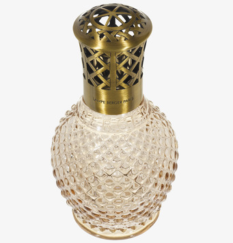 Bild av elegant vintage doftlampa med glas och metall