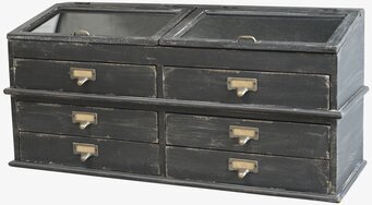 Bild av rustik byrå med glaslock och antika detaljer