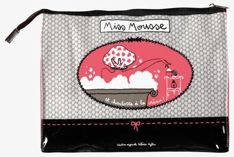 Bild av charmig necessär med lekfull design och detaljer