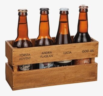 Bild av rustik trälåda för julens flaskförvaring