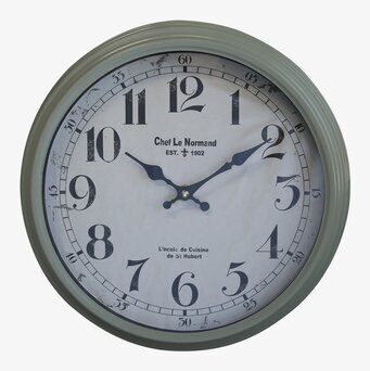 Bild av vintageinspirerad väggklocka med grön ram