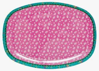 Bild av färgglad tallrik med blommönster och rosa ton