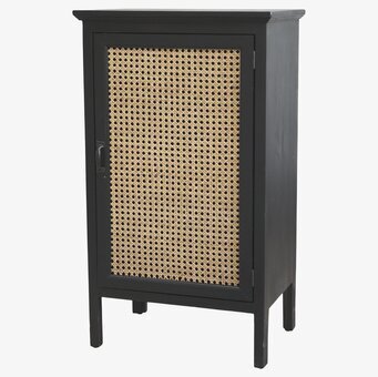 Bild av elegant skåp med svart ram och rottingdörr