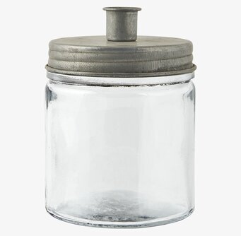 Bild av stilren ljusstake i glas med zinklock