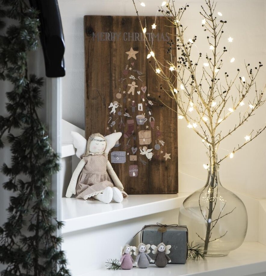 Ljusslinga 40 Stjärnor från IB Laursen över kvist i glasvas