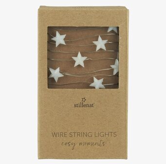 Bild av ljusslinga med stjärnor i elegant förpackning