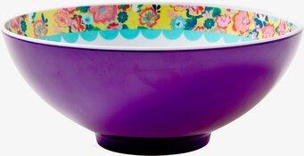 Bild av skål med livligt blommönster och lila utsida