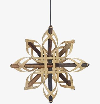 Bild av dekorativt objekt med flätat stjärnmönster