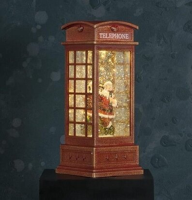 Bild av charmig snöglob med telefonkiosk och tomte