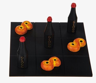 Bild av festligt Tre i rad-spel med svensk julkänsla