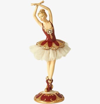 Bild av elegant balettdansös i röd och guld klädsel