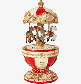 Foto av en nostalgisk karusellspeldosa i festliga färger