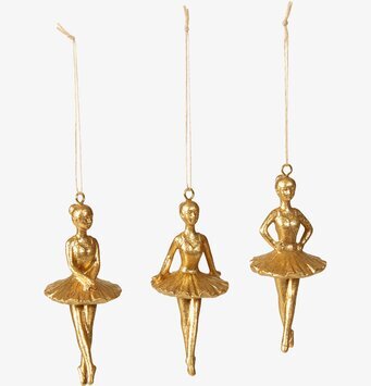 Bild av gyllene balettfigurer med eleganta detaljer