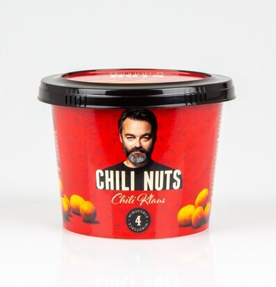 Bild av kryddiga nötter i röd premiumförpackning