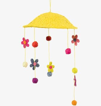 Bild av färgglad hängmobil med blommor och bollar