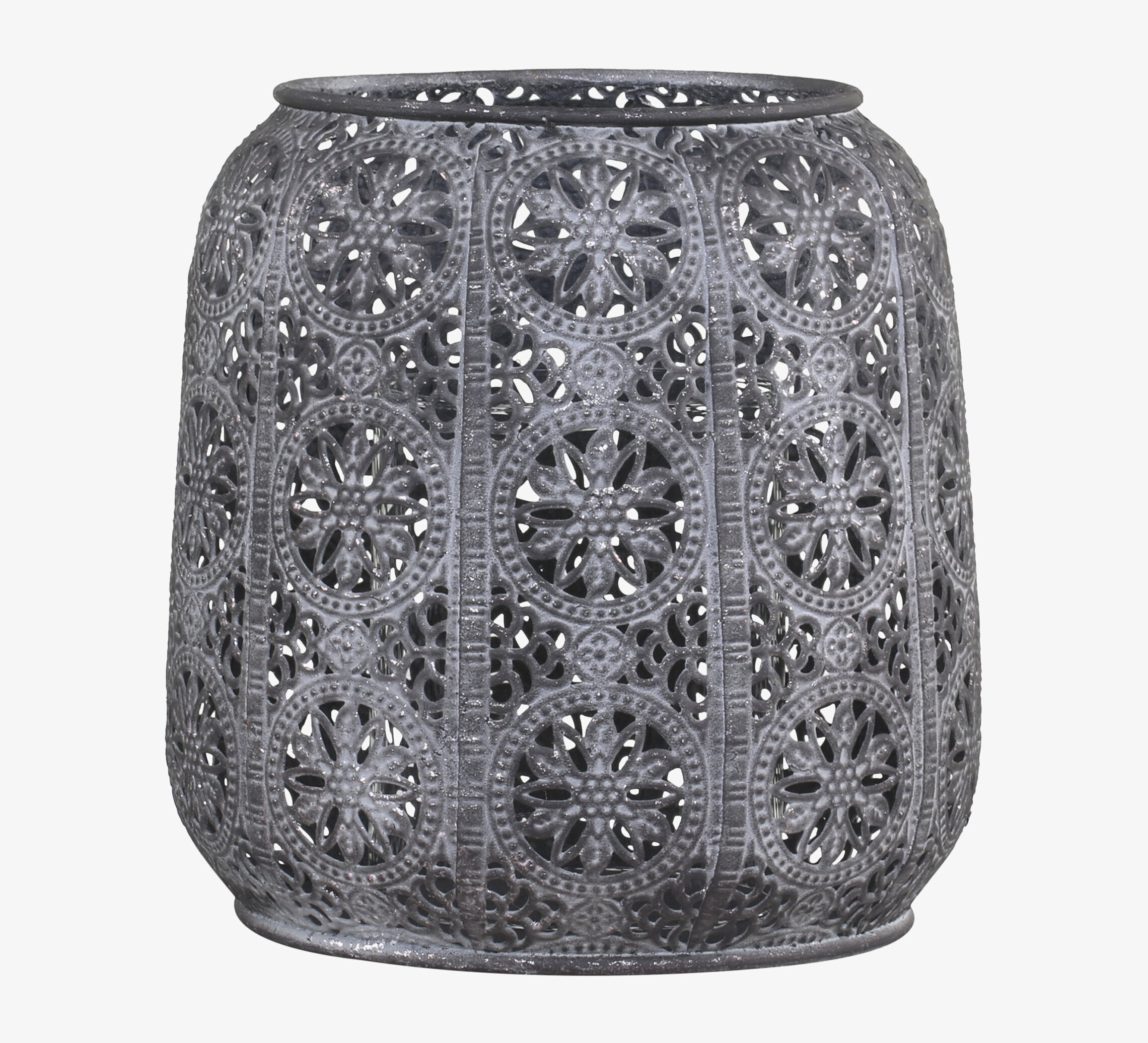 Foto av ljuslykta i antikbehandlad zink med mönster