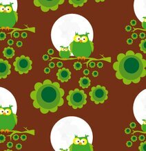 Bild av färgglatt och lekfullt presentpapper med ugglor