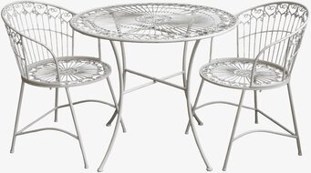 Bild av smakfullt och detaljrikt caféset i metall