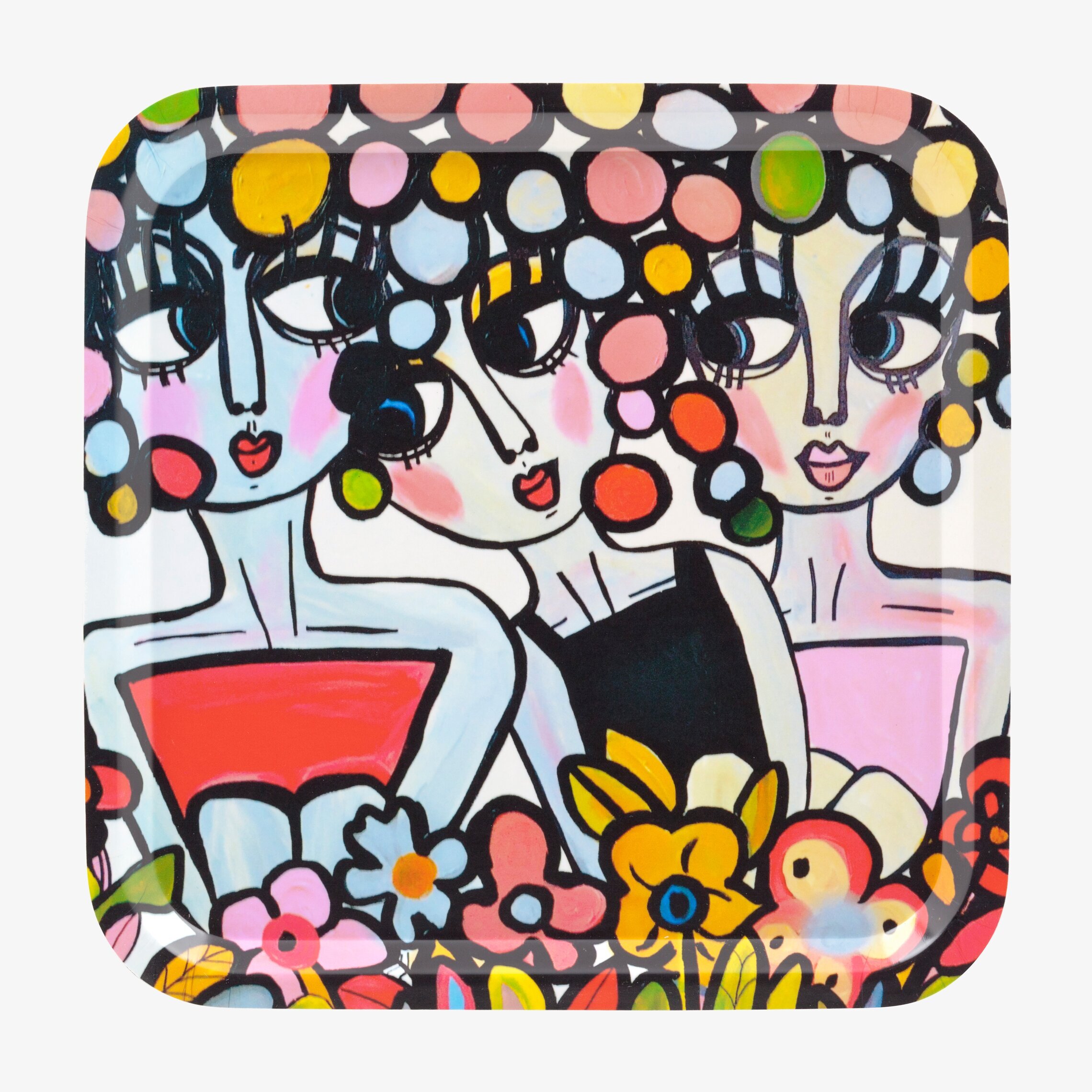 Bild av färgglad bricka med stiliserade ansikten och blommor