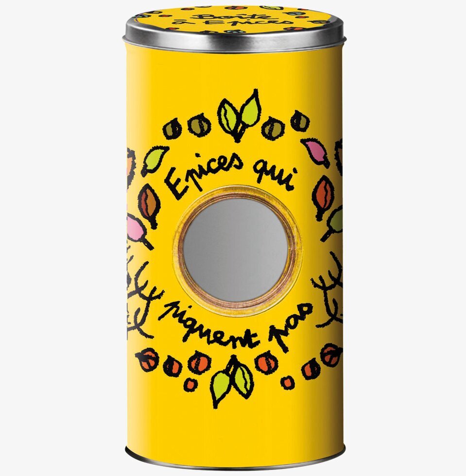 Bild av livfull gul plåtburk med insyn och dekorationer