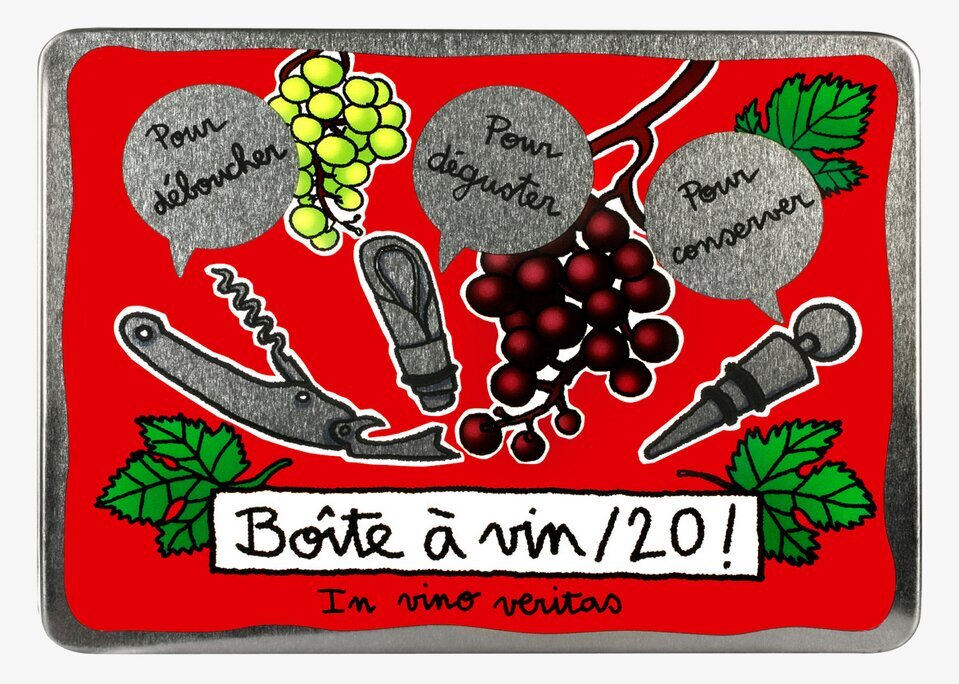 Bild av färgglad plåtburk med vinmotiv och tillbehör