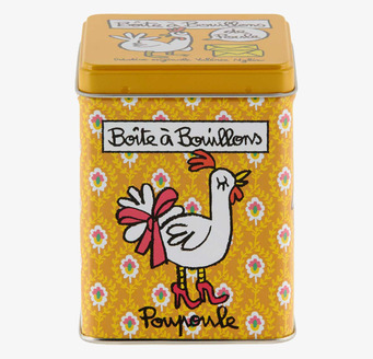 Foto av färgglad plåtburk med lekfullt hönsmotiv