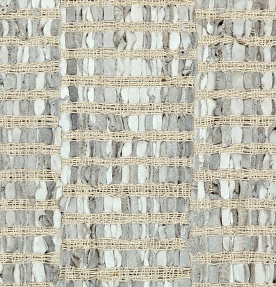 Bild av elegant trasmatta med läderdetaljer och textur