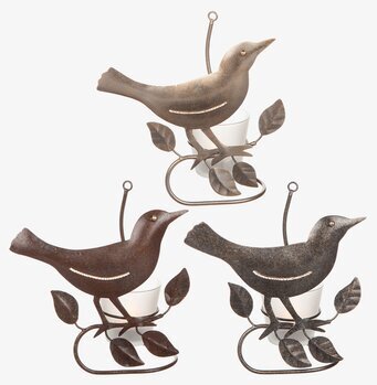 Foto av charmiga ljuslyktor med fågeldesign