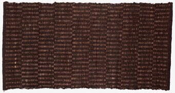 Bild av stilren trasmatta i jordnära bruna toner