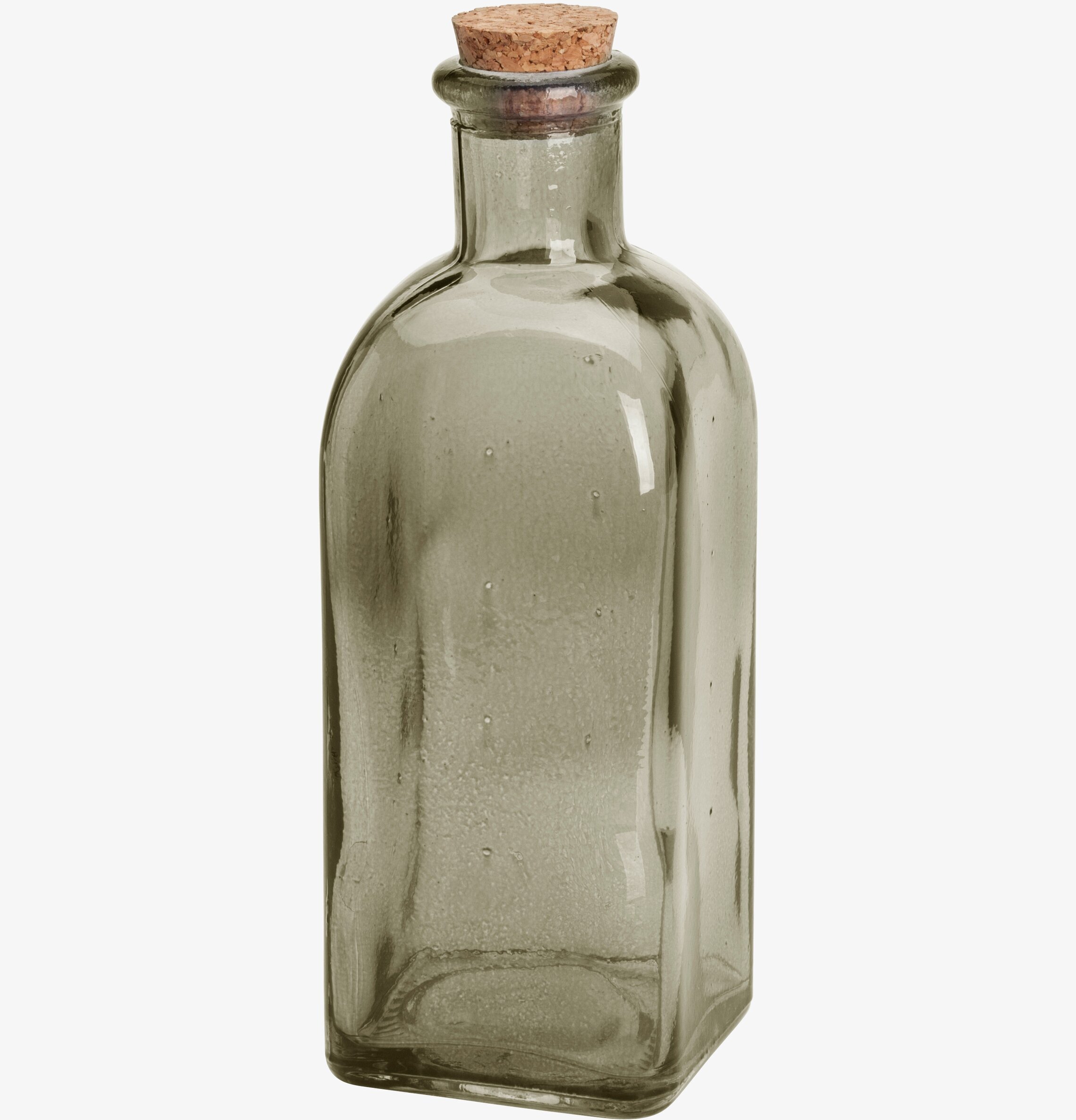 Bordsflaska Rökgrå, 0,5L från Dixie på ett avskalat bord