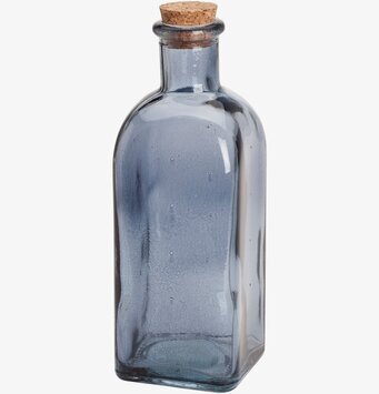 Bild av stilren bordsflaska med dimblå glasdesign