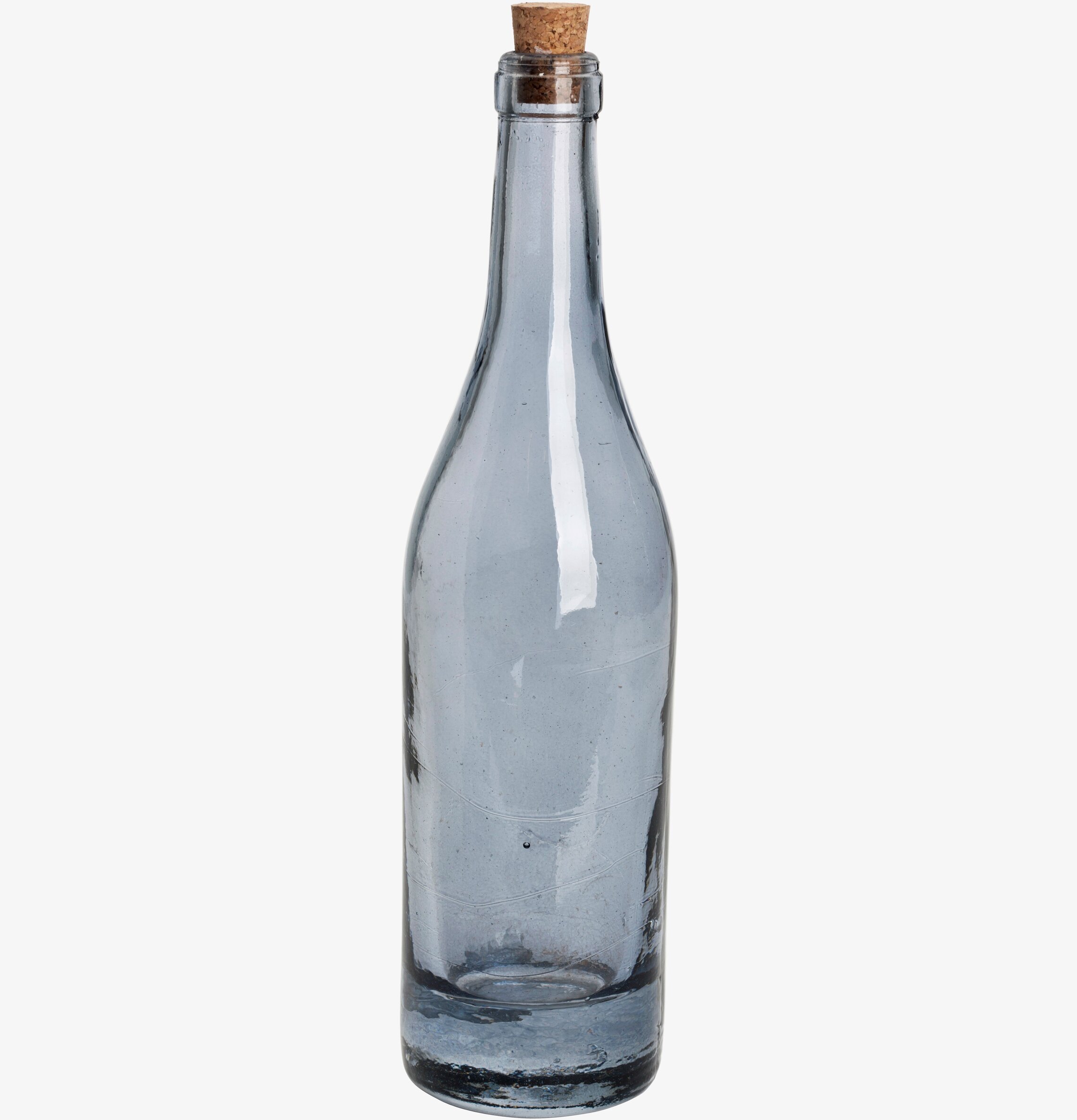 Bild av elegant dimblå flaskformad glasvas med korkpropp