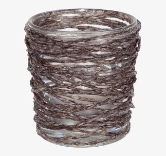 Bild av dekorativ lykta med flätat rep och glasdetaljer