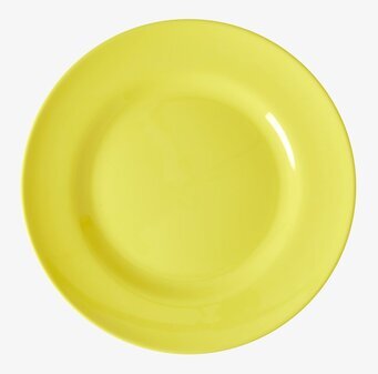 Bild av gul assiett med elegant och livfull design
