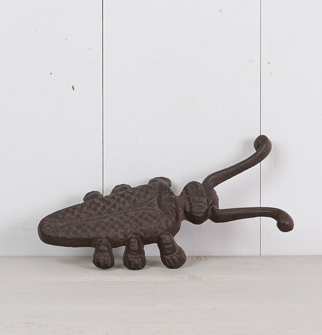 Stövelknekt Gjutjärn från Multi Agentur på ljus träbakgrund