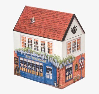 Bild av charmig plåtburk formad som ett pittoreskt hus