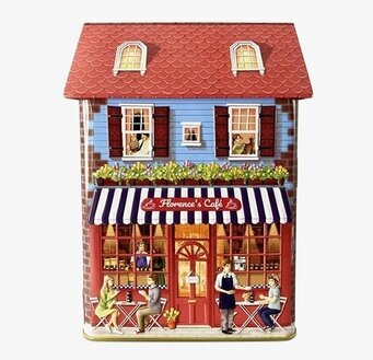 Bild av färgglad plåtburk som townhouse med café