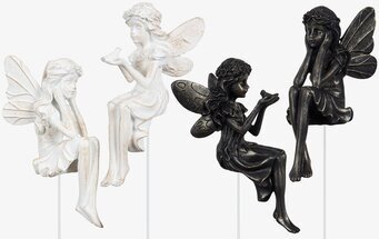 Bild av fyra detaljerade älvfigurer i olika färger