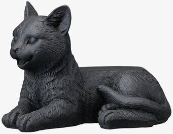 Bild av detaljerad svart kattfigur i vilande position
