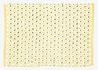 Bild av dörrmatta med geometriskt harlekinmönster