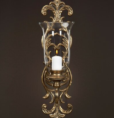 Bild av elegant guldbrun ljushållare för väggdekor