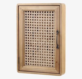 Bild av nyckelskåp med flätad rotting och trädetaljer