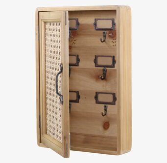 Foto av elegant nyckelskåp i ljust trä och rotting