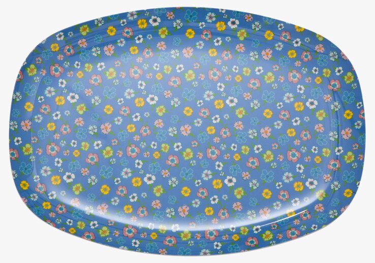 Bild av en färgglad, blommig tallrik med djup design