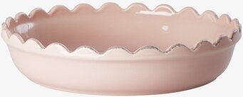 Bild av rosa pajform med vågig kant och glansig yta
