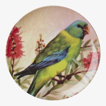 Bild av rund tallrik med fågelmotiv i vintage-stil