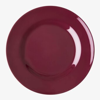 Bild av elegant assiett i djup maroon för dukningar