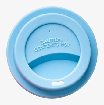 Bild av runt silikonlock i blått med varningstext