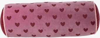 Bild av cylinderformad prydnadskudde med hjärtmönster