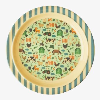 Bild av livfull barntallrik med bondegårdsmotiv